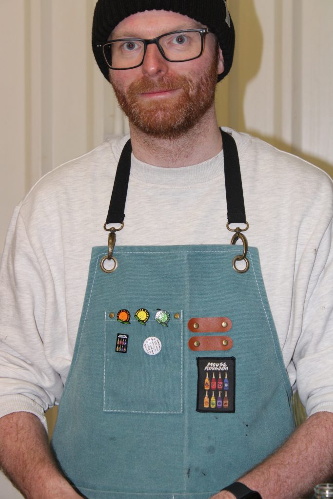 A Liqueur distillery person featuring artwork designed by artists who work in Bars and restaurants in the UK.
